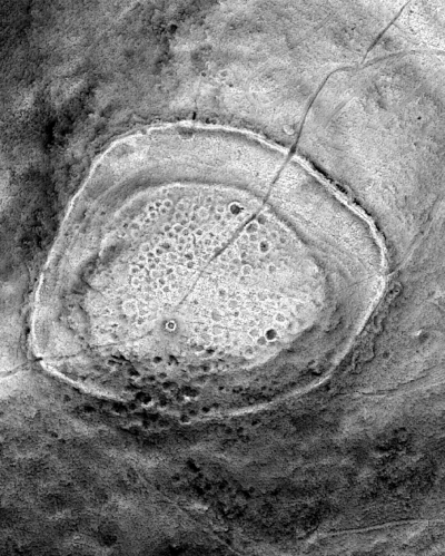 A LiDAR image of the summit of South Barrule. LiDAR (Light Detection and Ranging) is a method of scanning the ground from aircraft using lasers. This image, provided by Steve Davis of University College, Dublin, reveals numerous hut circles that were previously unknown.