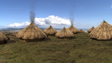 An impression of the summit with some of the thatched huts.