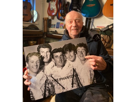 Barney McGowan with a photograph of The Phantoms