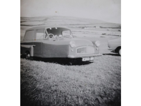 Mr Eric Kelly's first car, a bond 3 wheeler, which cost him £357