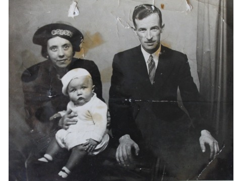 Mr Eric Kelly aged c.6 months old with his mother and father