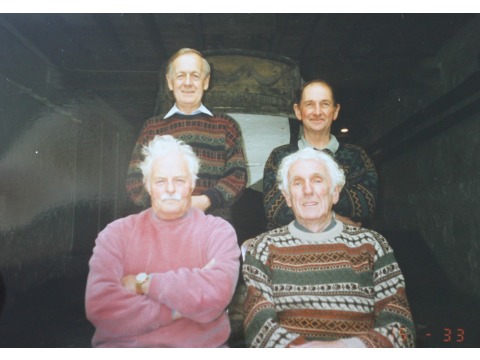 Attendants who used to work at the Nautical Museum in Castletown. From left to right: back row, Eric Teare and Keith Collister; front row, Mr John McGowan and Geoff Corrin. Date unknown.