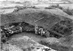 A photograph from the dig in 1912 showing the pit that was dug on the top of the hill.